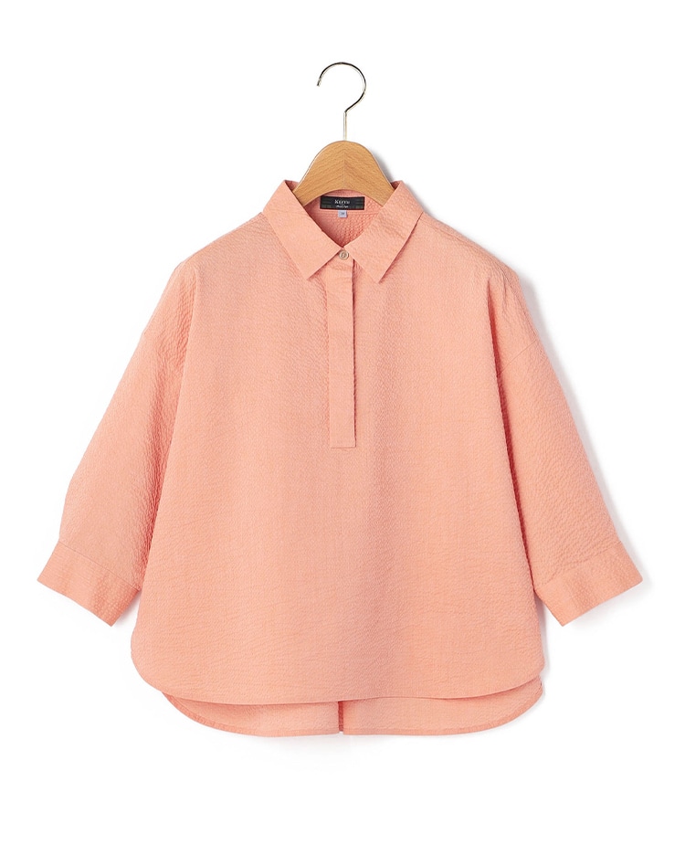 ピンクのブラウス