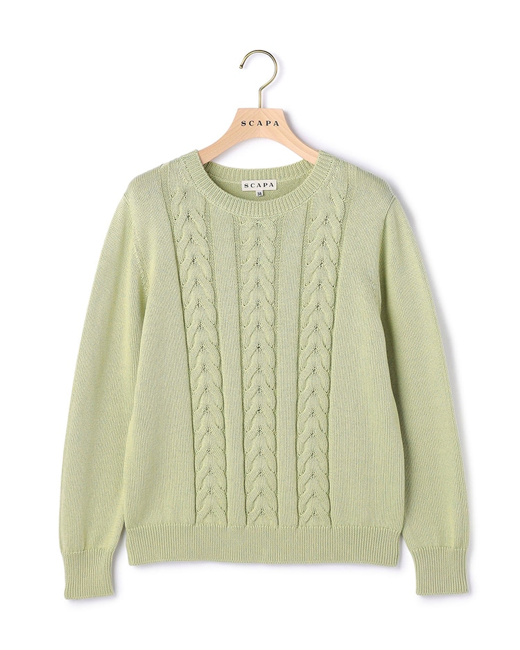 グリーンのニット