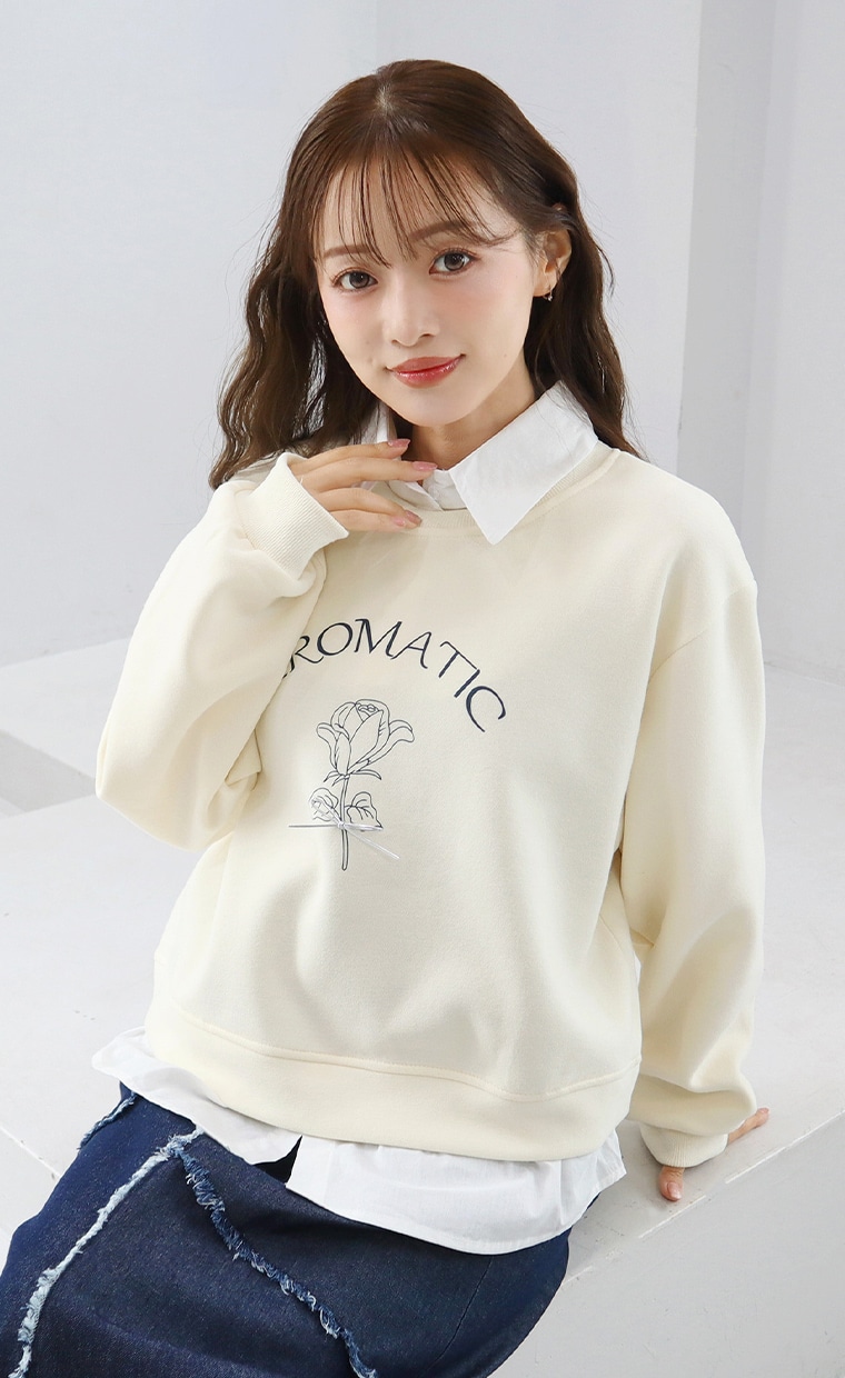 ドッキングプルオーバーとフリンジ切替スカートを着用の女性