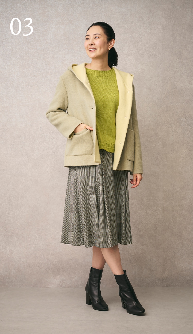 ライトグリーンのコートを使用したスタイリング