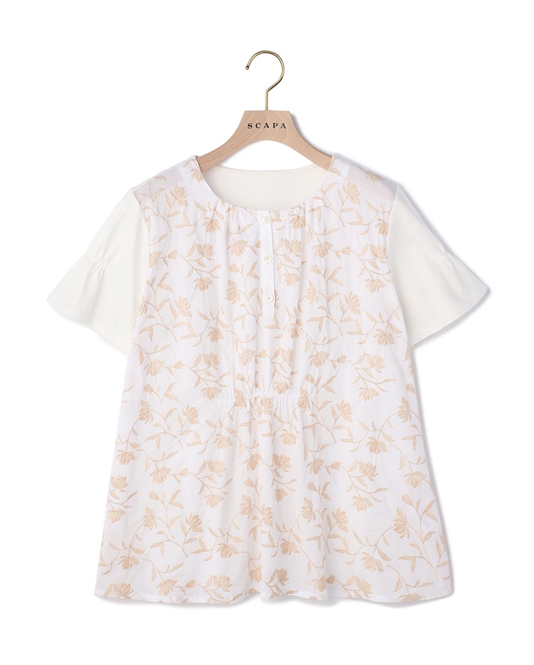 オレンジのフラワー柄のカットソー