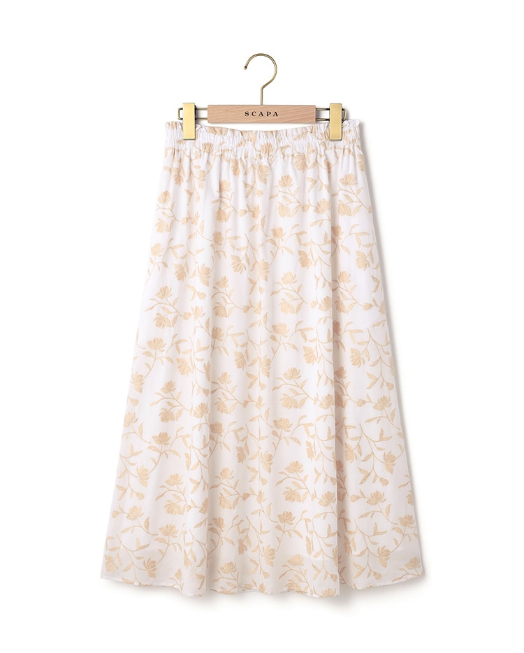 オレンジのフラワー柄のスカート